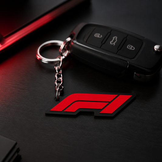 Motorsport emblem keychain attached to a car key