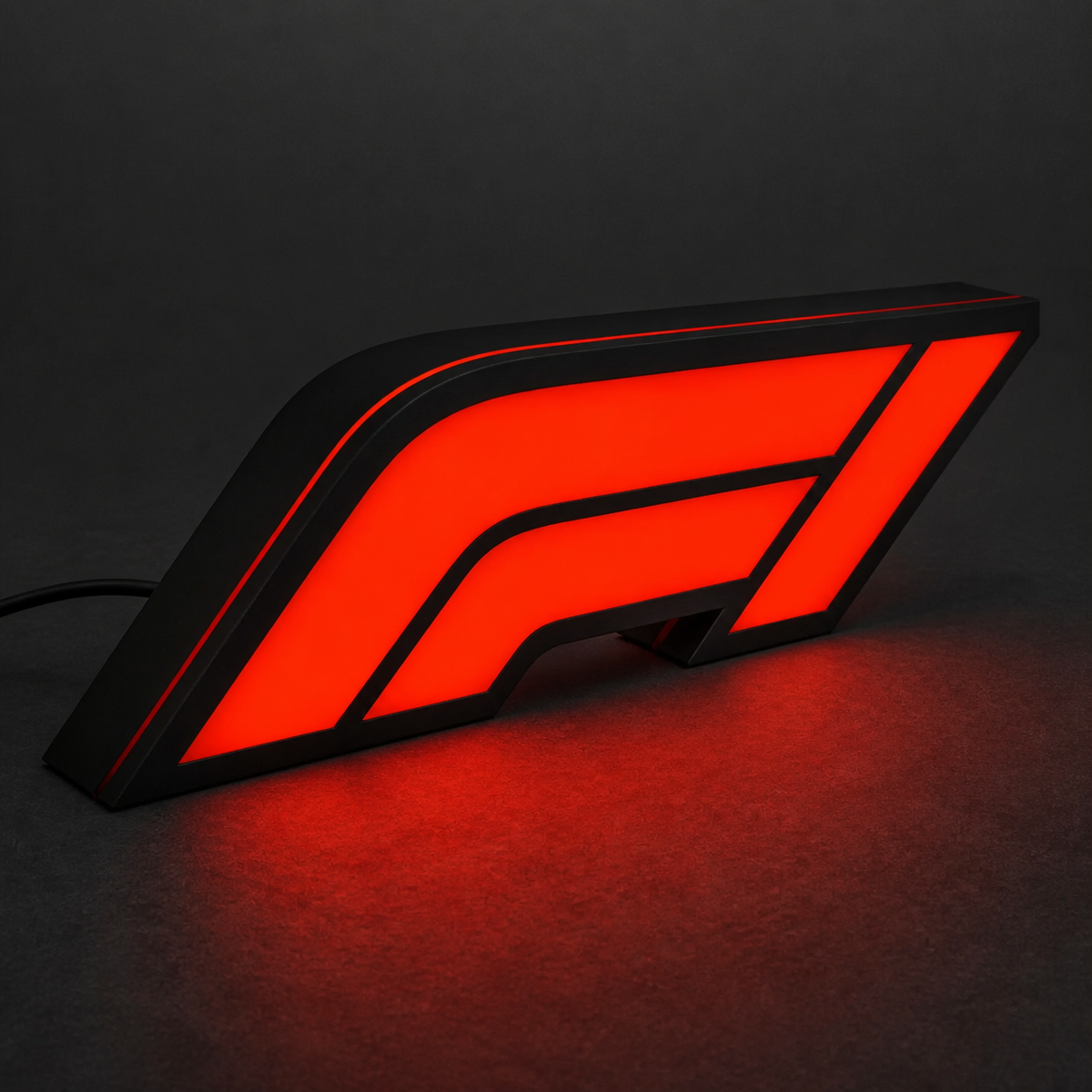 Side detail of red F1 racing lightbox lamp with black housing