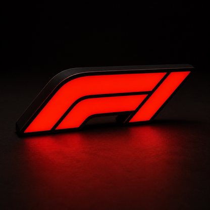Red illuminated F1 racing lightbox lamp on a dark studio background