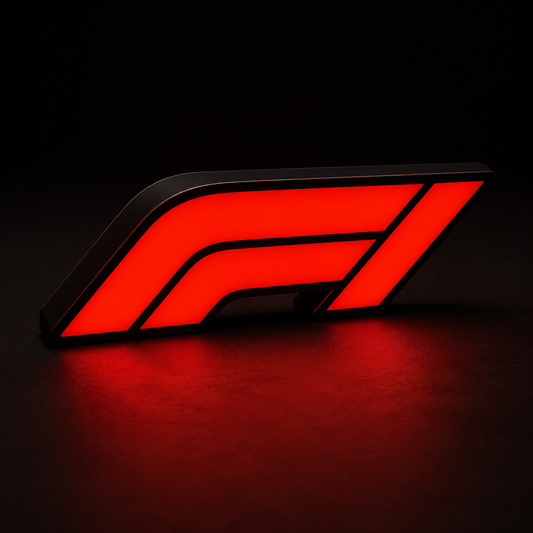 Red illuminated F1 racing lightbox lamp on a dark studio background