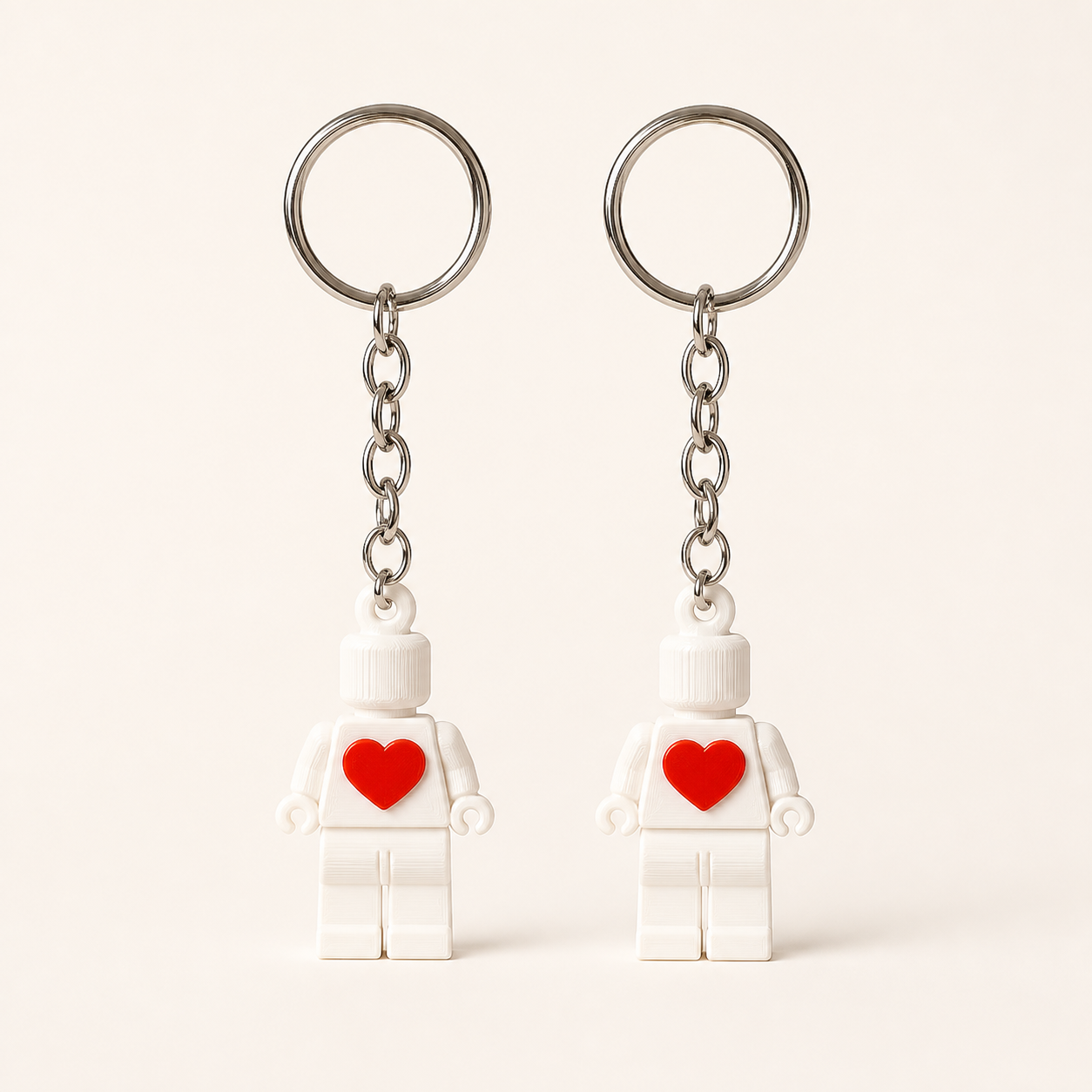 Matching heart couple keychain set of two on a clean studio background