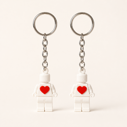 Matching heart couple keychain set of two on a clean studio background