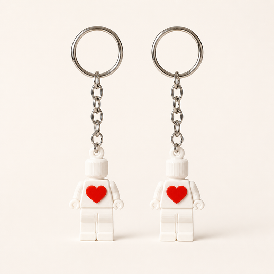 Matching heart couple keychain set of two on a clean studio background