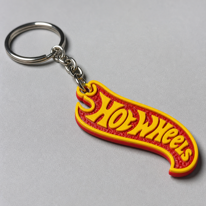 Close-up of red and yellow racing flame keychain texture