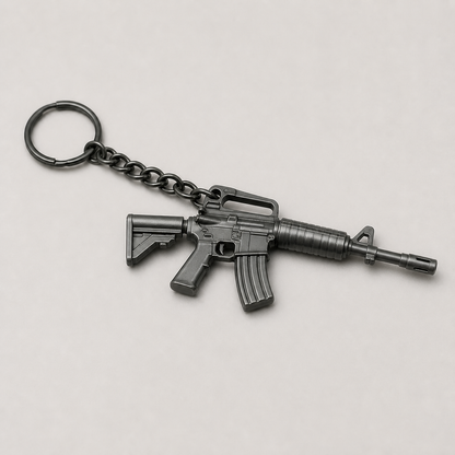 Black tactical rifle miniature keychain shown from an alternate studio angle